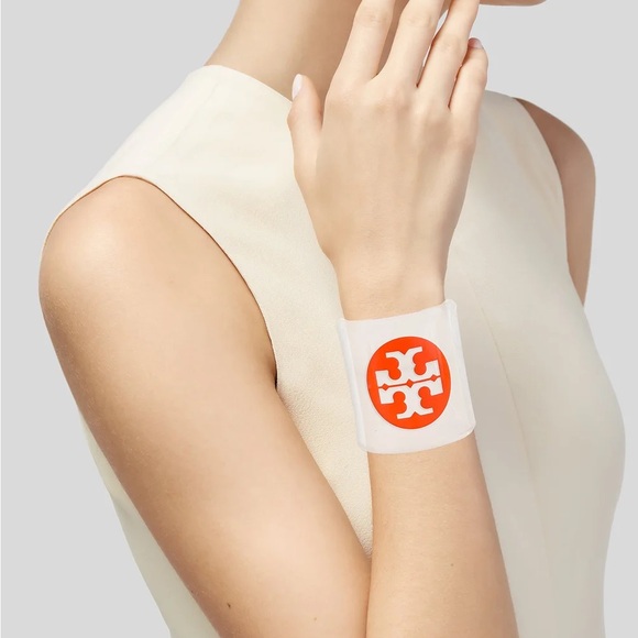 Tory Burch Jewelry - Tory Burch LUCITE CUFF BRACELET ORANGE LOGO